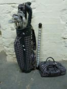 A set of Regency golf clubs in bag with matching carry bag and ball collector.