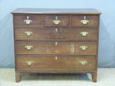 A Georgian mahogany chest of three over three graduated drawers with brass loop handles,