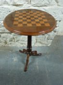 A 19thC rosewood occasional table with chess board top,