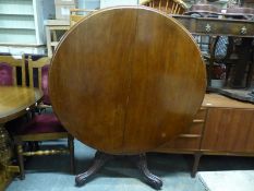 A 19thC mahogany tilt top breakfast table, on pedestal support tripod legs,