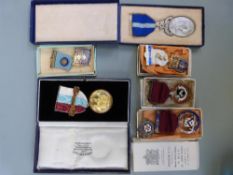 Six Masonic medals including cased silver examples, 1930's enamelled examples,