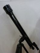 Tasco 60mm astronomical telescope on tripod