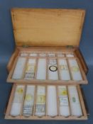 A case of 12 trays of 19thC or early 20thC microscope slides,