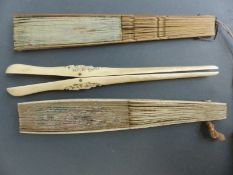 A 19thC Chinese carved ivory pair of glove stretchers,