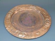 Arts and Crafts / Art Nouveau copper charger with embossed border, stamped J.S. & S.B, 31.