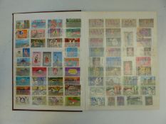 A box containing a large collection of stamps from Thailand in five stockbooks and a folder,