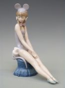 A Lladro figurine of a ballerina in cat costume,