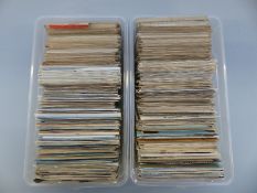 Two plastic boxes of mainly foreign postcards, some topographical,