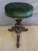 A Victorian rosewood adjustable piano stool