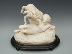 A large Victorian Parian ware figure allegorical of jealousy with two goats and a reclining female