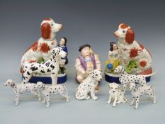 A pair of Staffordshire mantel dogs,