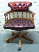 A leather Chesterfield captain's swivel chair