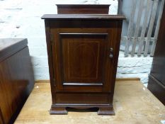 An Edwardian inlaid mahogany pot cupboard,
