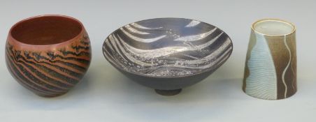 Three pieces of studio pottery including bowls by Anne James and a vase with painted abstract