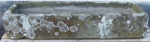 A rectangular carved natural stone trough (L107 x W42 x H20cm)
