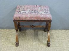 A 19thC cross framed stool with gilt decoration,
