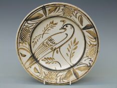 A Seth Cardew for Wenford Bridge studio pottery stoneware plate decorated with a bird,