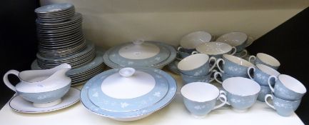 A Royal Doulton dinner and tea service in the Reflection pattern, mostly six place settings,