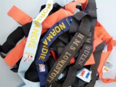 A collection of Naval hat bands including HMS Lowestoft x 3, Repulse, HMS Queen x 2,