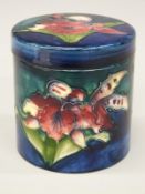 Moorcroft lidded jar with screw top in the Freesias pattern,