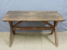A 19thC oak topped pitch pine tavern table with cross frame,