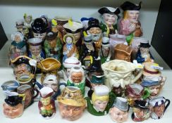 A large collection of character and toby jugs including Royal Doulton,