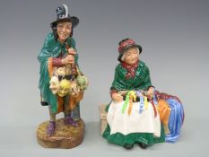 Two Royal Doulton figures Silks and Ribbons HN2017 and The Mask Seller HN1706,