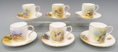 Six Royal Worcester coffee cans and saucers hand decorated with birds,