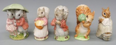 A collection of five Beswick Beatrix Potter figures of squirrels to include Goody Tiptoes,
