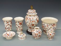 A collection of Wade pottery in a one-off colourway including lamp base, vases and ginger jars,