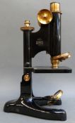 A model 22 Beck of London microscope in oak case