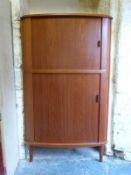 Skovmand and Andersen Danish retro teak tambour fronted floor standing corner cupboard with five