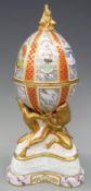 Royal Worcester limited edition The Oceanic Egg with hallmarked silver gilt mounts, 1986 16/50,