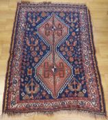 A small Turkoman rug on blue ground,