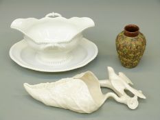 A collection of ceramics to include a Royal Worcester blanc de chine wall pocket,