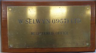 A brass plaque of Stroud interest W.