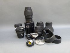 A quantity of SLR camera lenses including Sigma 35-135m 1:4-5.6, 24-70mm 1:3.5-5.6, 70-120mm 1:4-5.