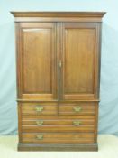 A 19thC stained ash and pine linen press, the base fitted two over two drawers,