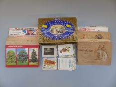 An assortment of cigarette and tea cards to include railway engines & cricketers,