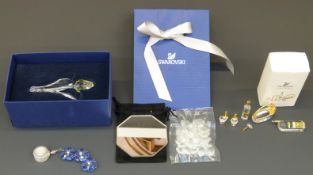 A collection of Swarovski Crystal items to include tulip blossom suncatcher,