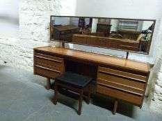 A retro dressing table and stool,