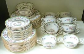 A Spode dinner service in Eden pattern, mostly twelve place settings,