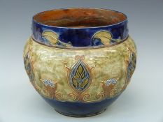 A large Royal Doulton jardiniere of Art Noveau design by Maud Bowden, impressed marks to base,