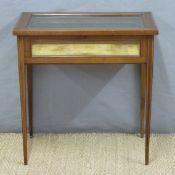 A 19thC crossbanded silver/bijouterie table raised on square, tapering legs,