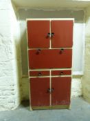 A vintage/retro 1950s kitchen cabinet with an arrangement of cupboards, drawers and fold down flap,