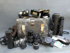 A quantity of SLR cameras and accessories comprising Minolta SRT 303b and Minolta XEI, Rokkor 1:1.