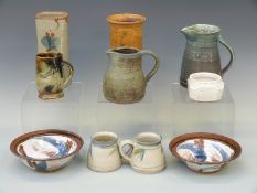 Ten pieces of studio pottery including Dartington Pottery vase and others,