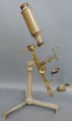 A 19thC Dollond of London microscope with extra lenses,