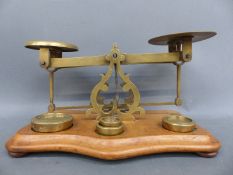 A set of Drake, Driver & Leaver of London postal scales, with weights,