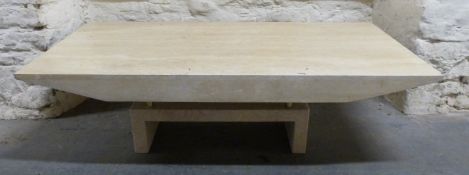 A cream retro-style marble topped coffee table with plinth base,